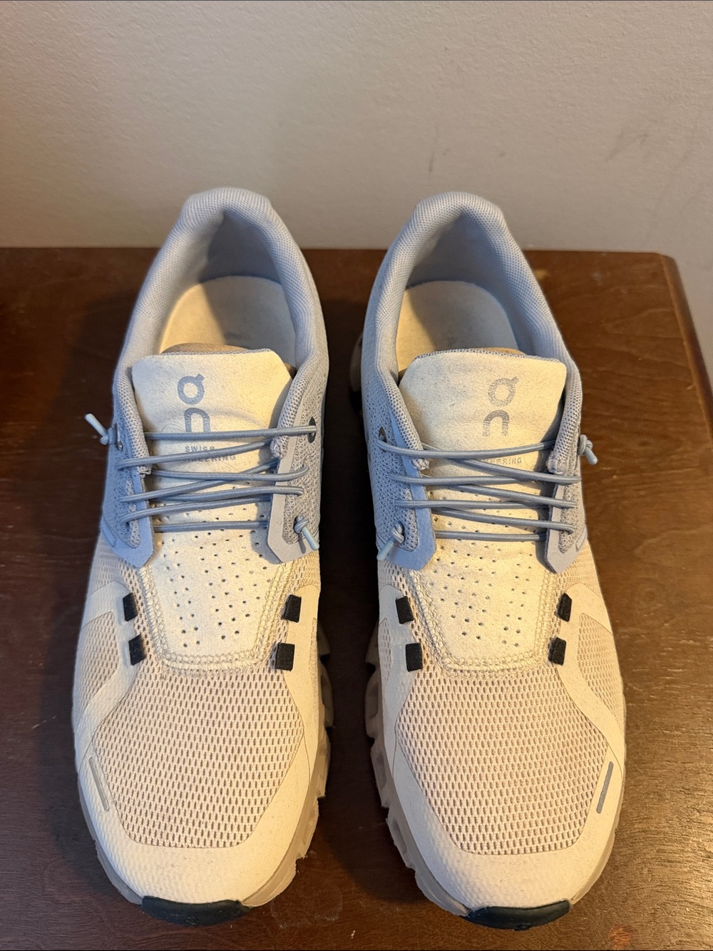 On Running Men's Athletic Shoes in Light Gray and Light Blue